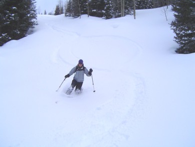 View of skier in deep snow